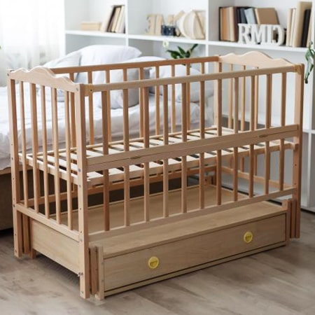 Дитяче ліжко - Анастасія натуральний бук з шухлядою,  маятниковим механізмом зі стопором та закритим ящиком